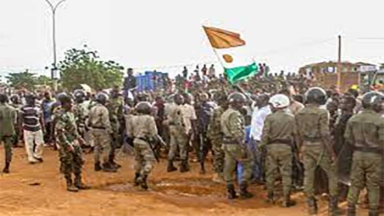 Tanzania police arrest two, accuse them of organising protests