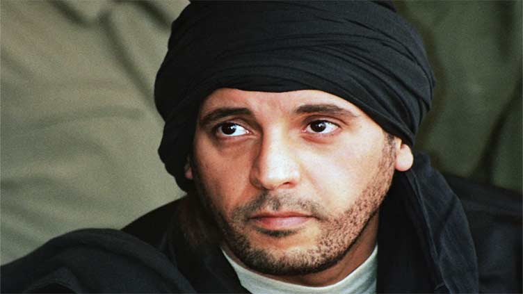 Libya asks Lebanon to release Gadhafi's detained son who is on hunger strike, officials say