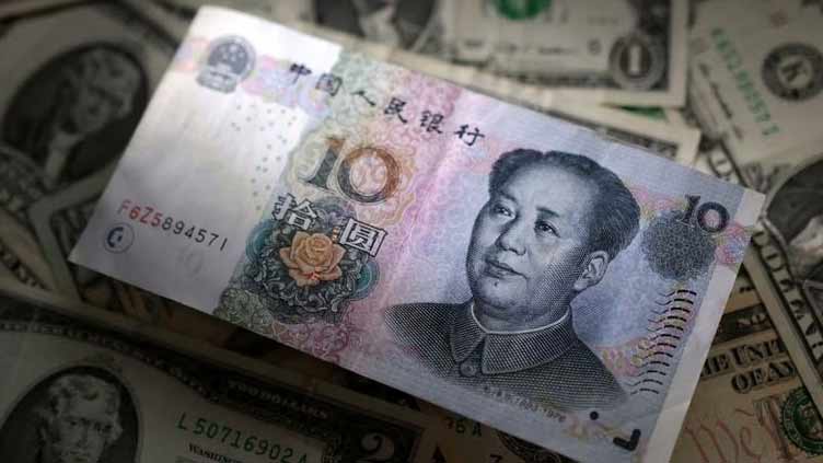 Yuan falls to 9-month low after China rate cut, sterling rises after jobs data