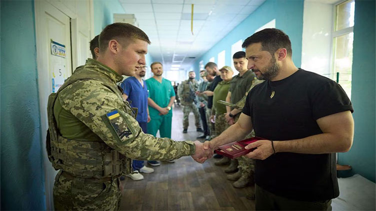 Ukraine's Zelenskiy meets troops in frontline Zaporizhzhia region