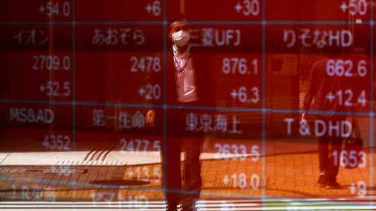 Global stocks slip on China data, European shares recover some ground