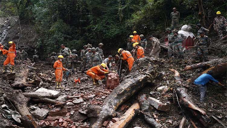 India landslides block trucks taking supplies to strife-torn Manipur