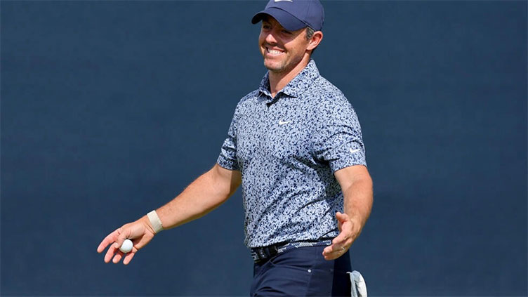 McIlroy, Harman share lead at rain-hit BMW Championship