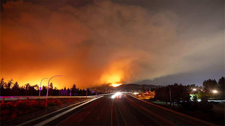 Canada's far north speeds up evacuations as fire nears main city