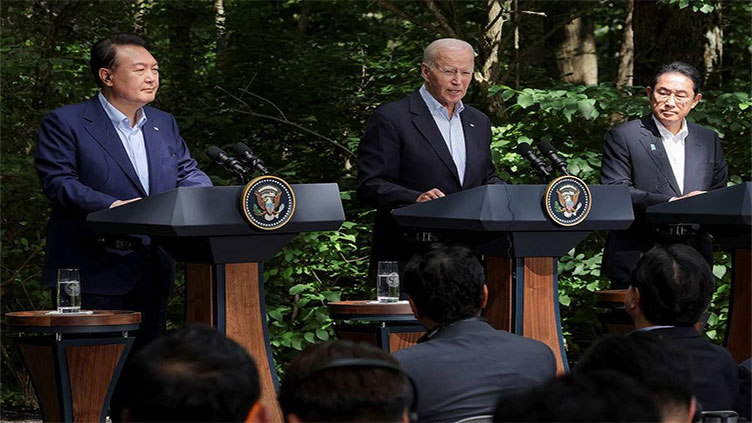 At Camp David, US, South Korea and Japan condemn China, agree to deepen military ties