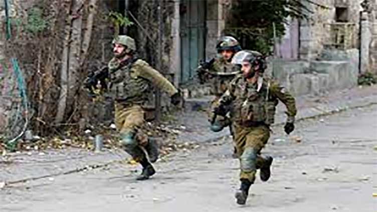 Suspected Palestinian gunmen wound two Israelis in West Bank-media