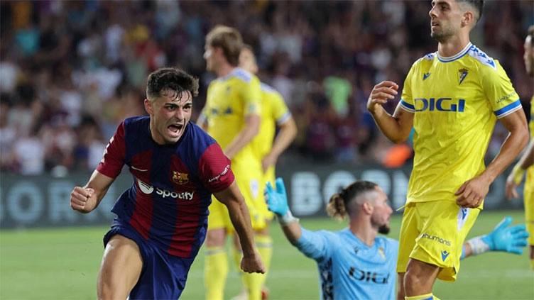 Barca snatch late win over Cadiz in new home, Atletico draw at Betis