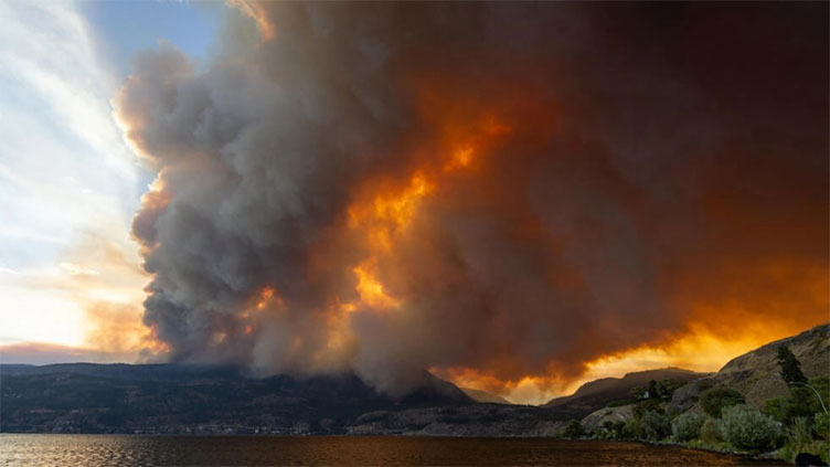 Wildfires ravaging western Canada force tens of thousands to flee