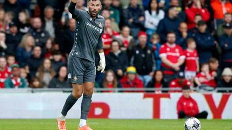 Wrexham keeper Foster announces retirement again at 40