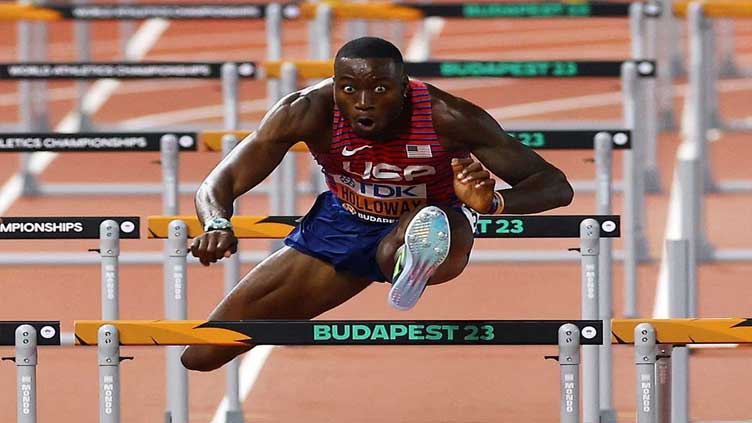 American Holloway wins third straight world 110m hurdles title