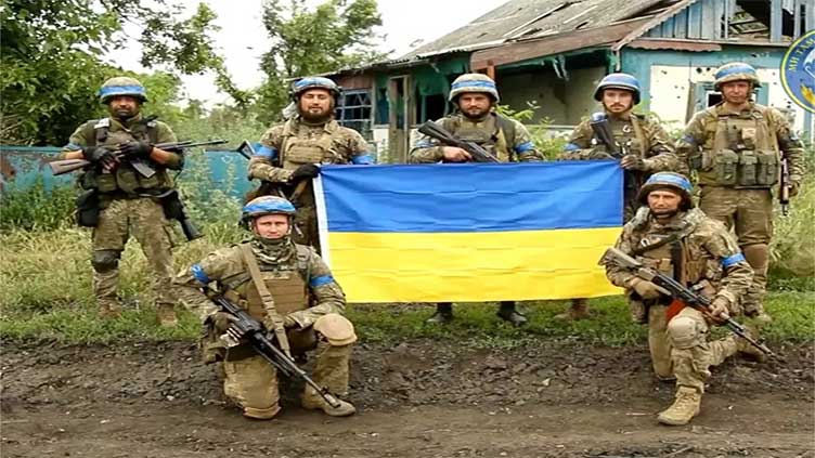 Ukraine forces raise national flag in Robotyne in Zaporizhzhia region