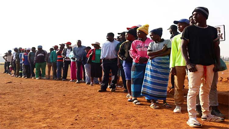 Zimbabwe sets extra day of voting in selected wards after delays