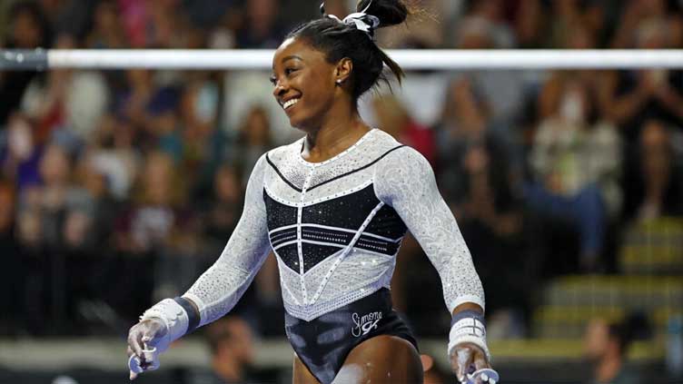 Rejuvenated Biles chases more history at US gymnastics championships