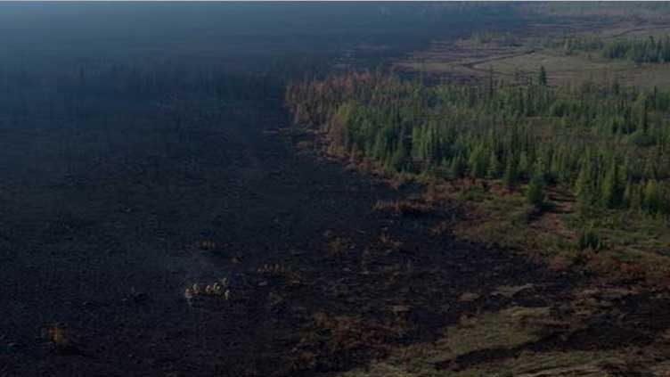 Entire town of Hay River in Canada ordered to leave as wildfires encroach
