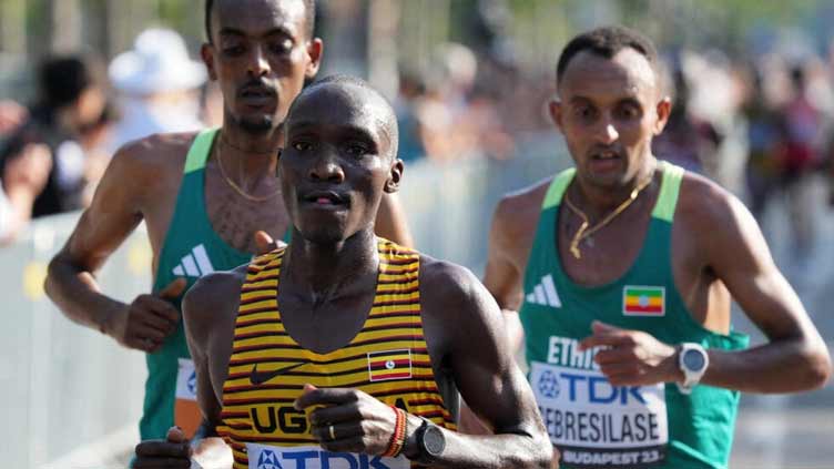 Uganda's Kiplangat wins men's world marathon title