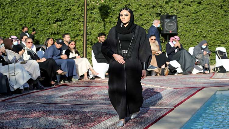 French ban of abaya robes in schools draws applause, criticism