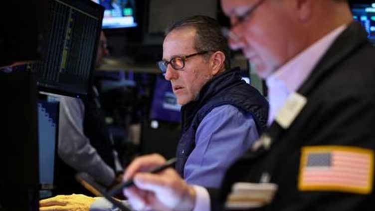 Wall St rises as weak economic data fuels rate-pause hopes