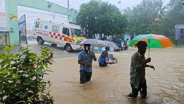 Heavy rains leave at least 8 people dead as Michaung makes landfall on India's southeastern coast