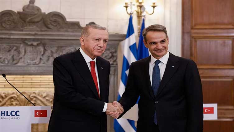Turning over a page, Greece and Turkey agree to mend ties