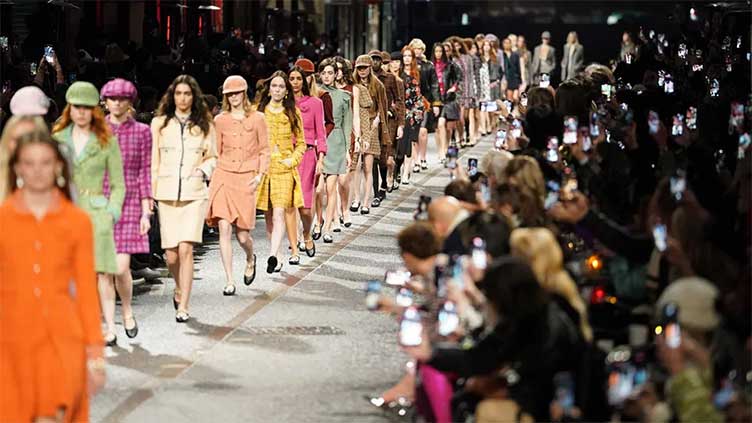 Models turn street into catwalk for fashion show