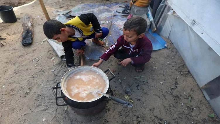 Palestinians starve as Gaza war rages amid fears of exodus into Egypt