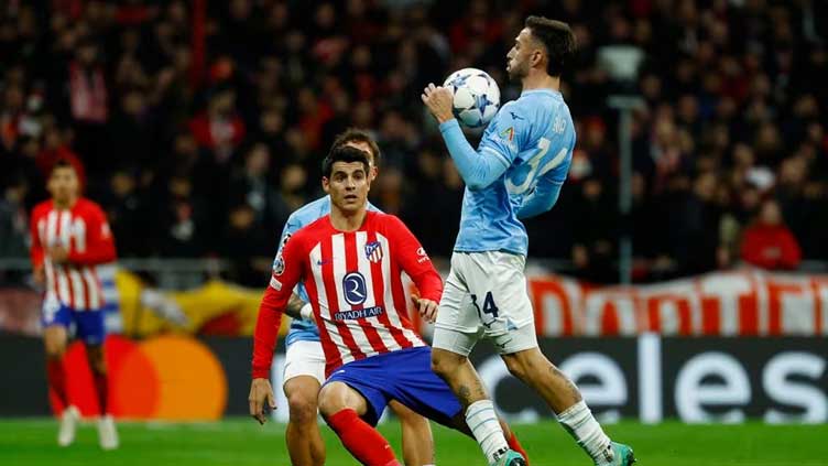 Atletico seal top spot with 2-0 win over Lazio