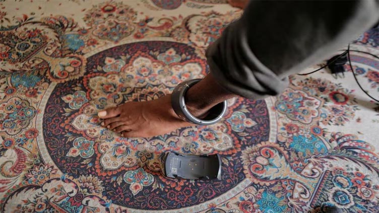 Senegal fits inmates with ankle tags to reduce prison crowding