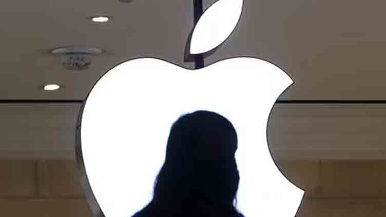 Apple reaches record high close as Fed signals rate cuts