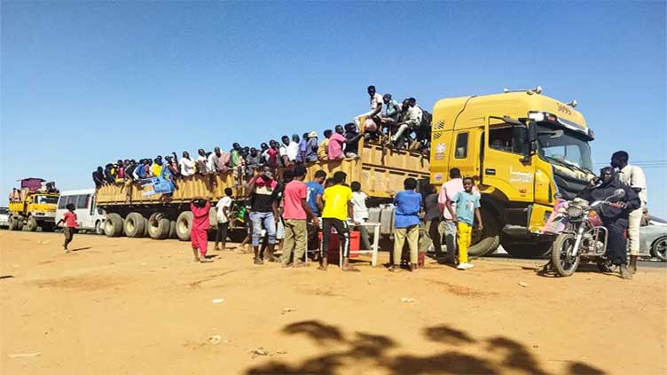 Thousands flee as war reaches Sudan's second-largest city