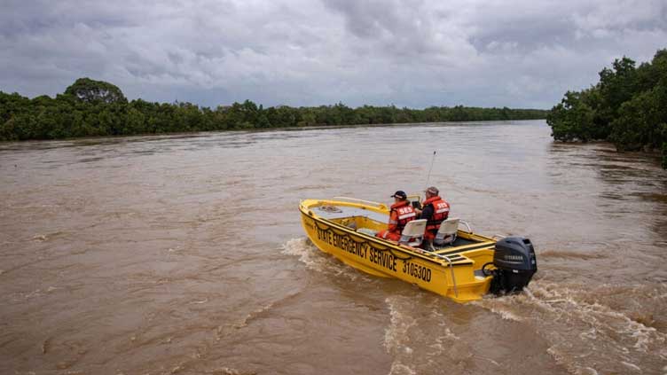 Rescue teams evacuate flood-ravaged Australian town