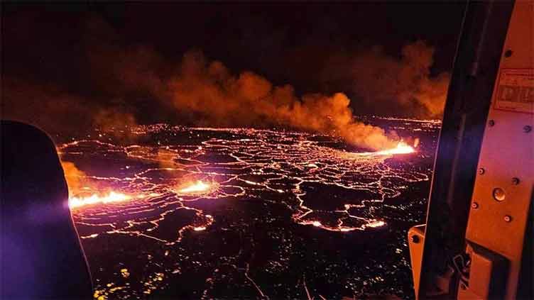 Iceland volcano erupts, missing fishing town of Grindavik for now