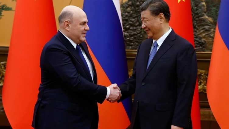 China's Xi says strong Russia ties a 'strategic choice'