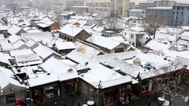 China's cold snap reaches Shanghai with chilliest year-end in 40 years