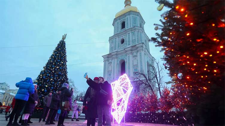 Ukrainians defy Moscow with first Dec. 25 Christmas