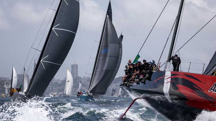 Duo battle for lead as storms force eight out of Sydney-Hobart