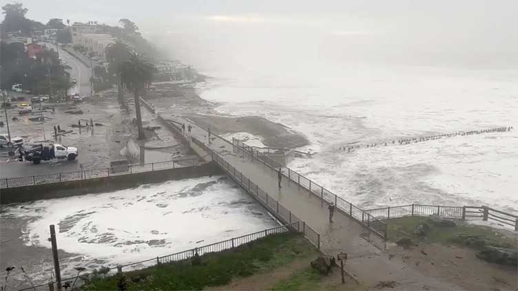 Big waves at California's Mavericks Beach draw surfers, 'super stoked' spectators