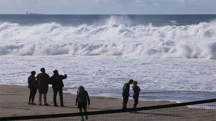 Massive waves on California coast cause flooding, force evacuations