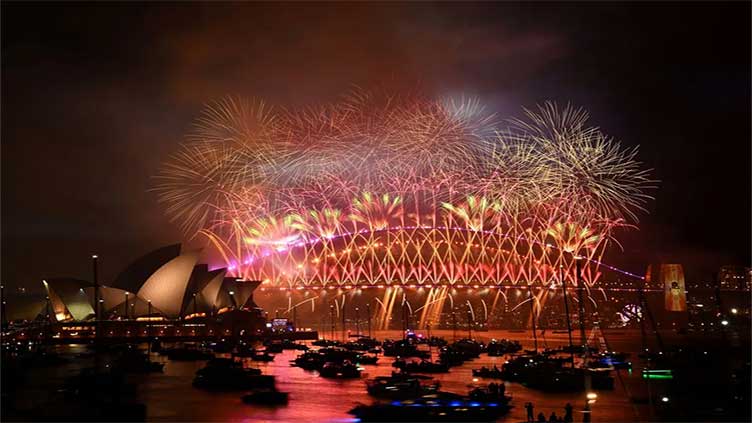 World starts welcoming New Year with fireworks, prayers and some stark words 