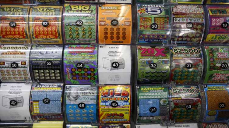Woman uses $5 free play coupon on lottery ticket, wins $300K