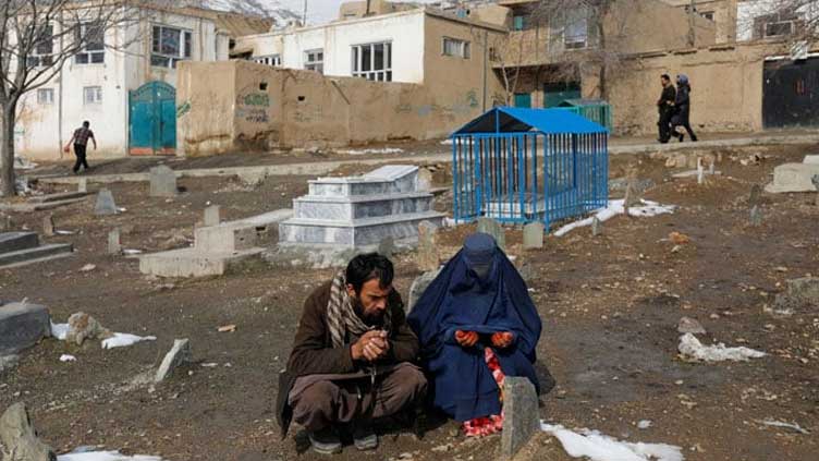  Parents grieve for three-month old baby, a victim of Afghanistan's deadly winter