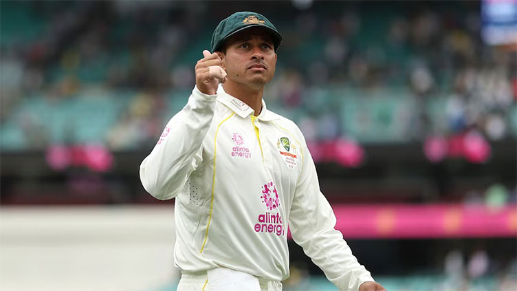 Australia's Khawaja flies out to India after visa approved