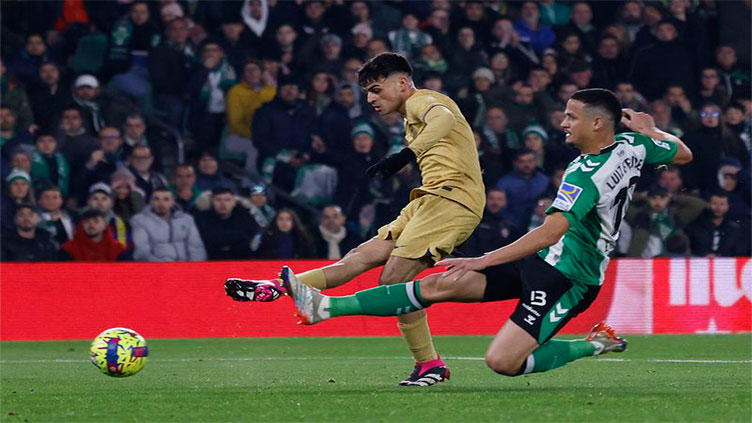 Barcelona secure gritty win at Betis to extend lead