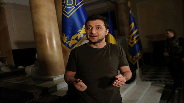 Zelenskiy wants tougher Europe, Putin evokes victory over Nazis