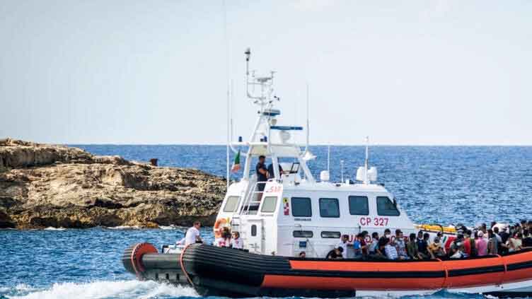 Italy recovers eight bodies from migrant boat