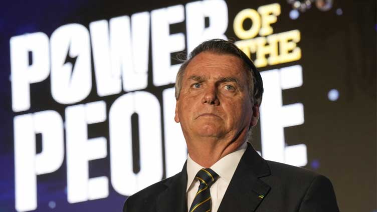  Bolsonaro ponders election defeat, as crowd chants 'fraud'