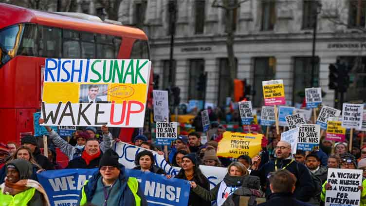 Britain faces largest ever healthcare strikes as pay disputes drag on