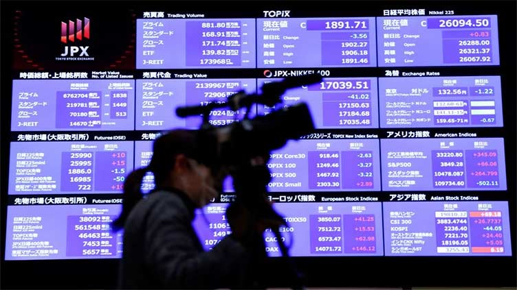 Asia shares skid, dollar gains as yields spike