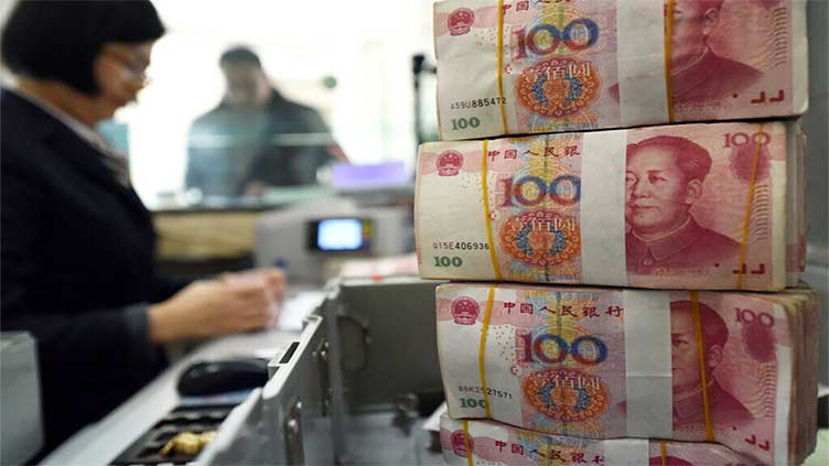 China's yuan firms after hitting 4-week low, strong US data caps gains