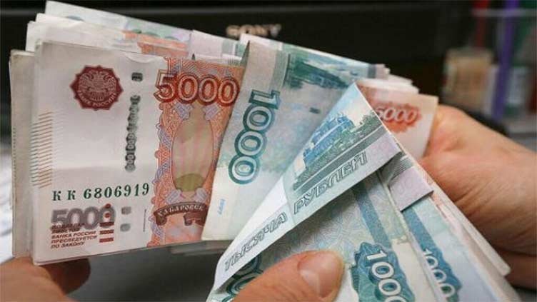 Russian rouble recovers after clipping near one-month low vs dollar