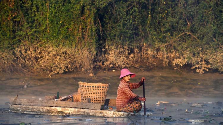 On the water with Myanmar's 'river cleaners'